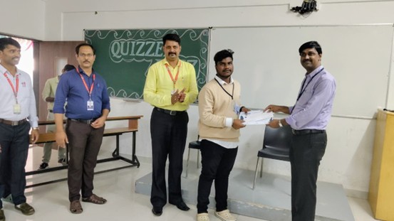 Hemanth S A receiving Emerge 2023 Technical and Leadership Excellence Awards
